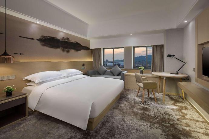Imagen de la habitación del Hotel Ramada Encore Wyndham Huzhou. Foto 14