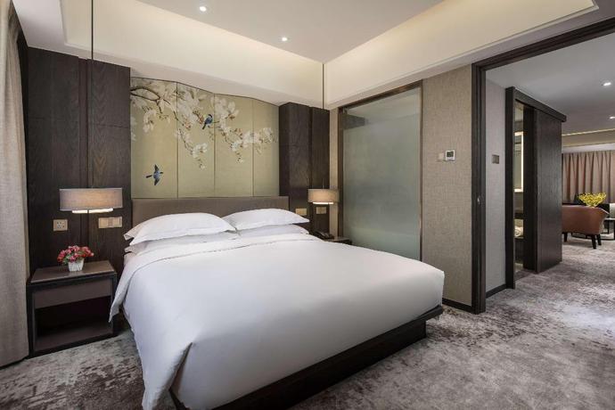 Imagen de la habitación del Hotel Ramada Encore Wyndham Huzhou. Foto 16