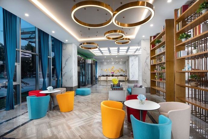 Imagen del bar/restaurante del Hotel Ramada Encore Wyndham Linyi. Foto 3