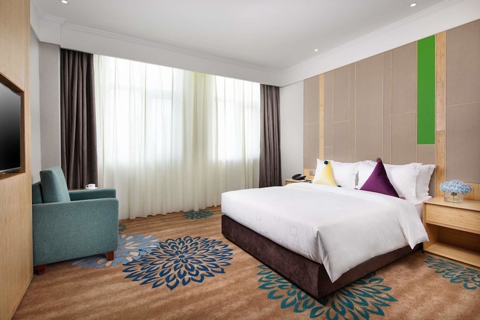 Imagen de la habitación del Hotel Ramada Encore Wyndham Linyi. Foto 6