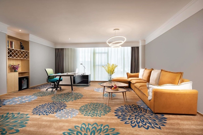 Imagen de la habitación del Hotel Ramada Encore Wyndham Linyi. Foto 11