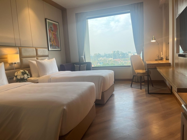 Imagen de la habitación del Hotel Ramada Encore by Wyndham Amritsar Airport. Foto 3