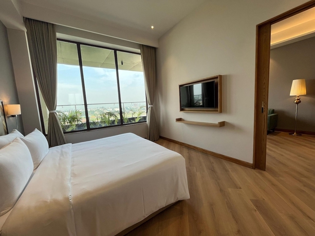 Imagen de la habitación del Hotel Ramada Encore by Wyndham Amritsar Airport. Foto 6