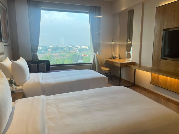 Imagen de la habitación del Hotel Ramada Encore by Wyndham Amritsar Airport. Foto 12