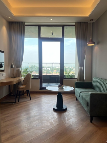 Imagen de la habitación del Hotel Ramada Encore by Wyndham Amritsar Airport. Foto 13
