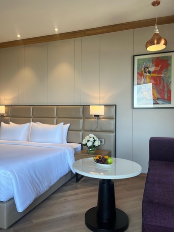 Imagen de la habitación del Hotel Ramada Encore by Wyndham Amritsar Airport. Foto 14