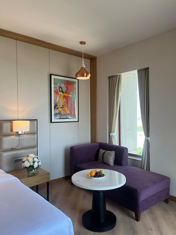 Imagen de la habitación del Hotel Ramada Encore by Wyndham Amritsar Airport. Foto 15