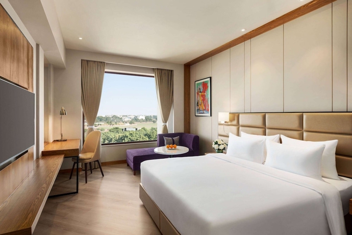 Imagen de la habitación del Hotel Ramada Encore by Wyndham Amritsar Airport. Foto 16
