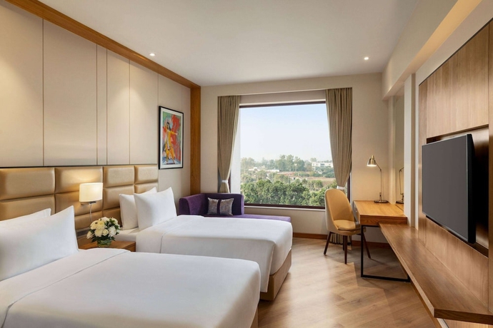 Imagen de la habitación del Hotel Ramada Encore by Wyndham Amritsar Airport. Foto 17