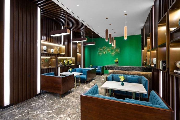 Imagen del bar/restaurante del Hotel Ramada Encore by Wyndham Chenzhou North. Foto 3