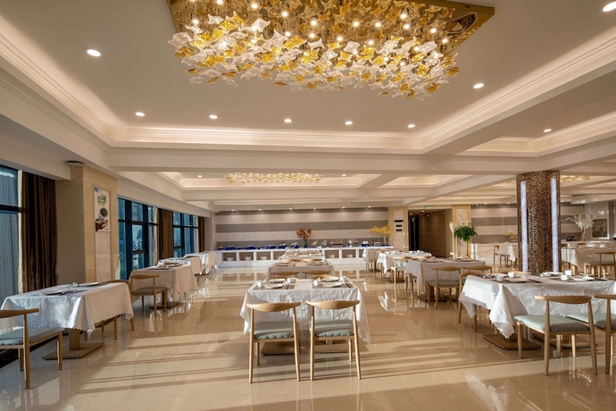 Imagen del bar/restaurante del Hotel Ramada Encore by Wyndham Chenzhou North. Foto 4