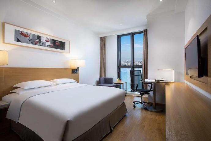 Imagen de la habitación del Hotel Ramada Encore by Wyndham Chongqing Yubei. Foto 5