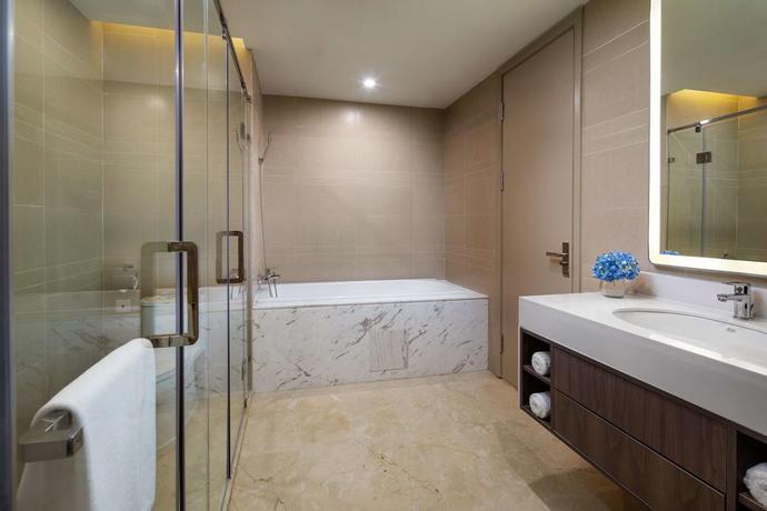 Imagen de la habitación del Hotel Ramada Encore by Wyndham Chongqing Yubei. Foto 7