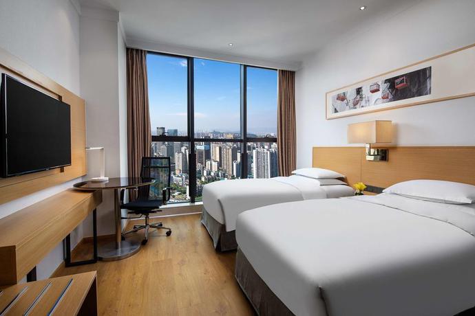 Imagen de la habitación del Hotel Ramada Encore by Wyndham Chongqing Yubei. Foto 10