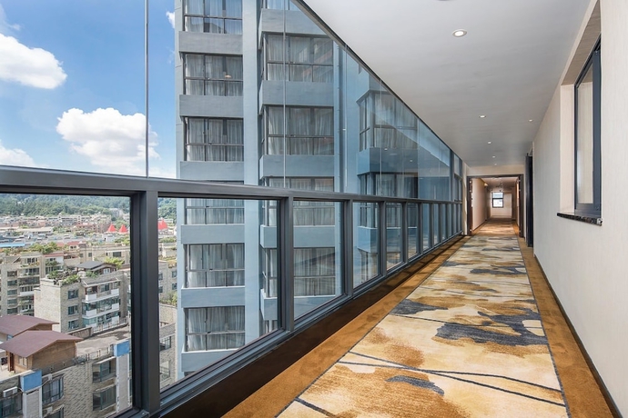 Imagen de los interiores del Hotel Ramada Encore by Wyndham Guiyang. Foto 16