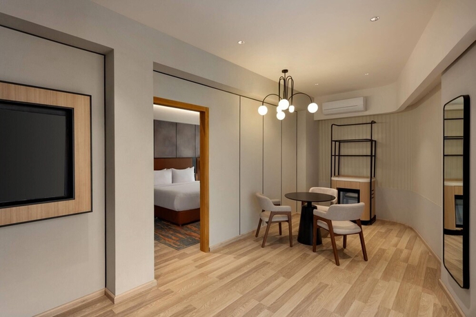 Imagen de la habitación del Hotel Ramada Encore by Wyndham Gurugram Dwarka Expressway. Foto 6