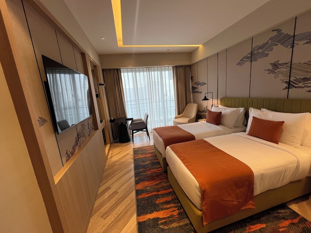 Imagen de la habitación del Hotel Ramada Encore by Wyndham Gurugram Dwarka Expressway. Foto 12