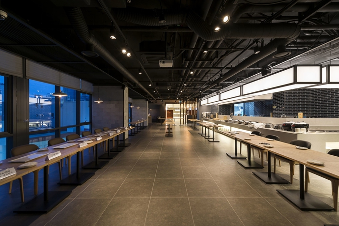 Imagen del bar/restaurante del Hotel Ramada Encore by Wyndham Haeundae. Foto 3