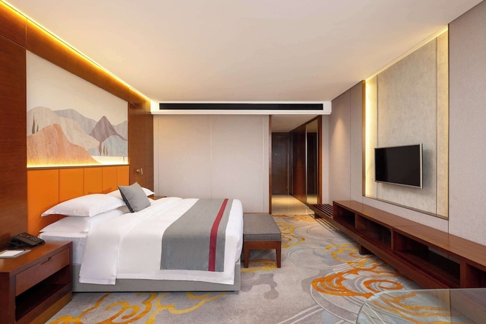 Imagen de la habitación del Hotel Ramada Encore by Wyndham Jingzhou Shashi. Foto 6