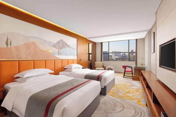 Imagen de la habitación del Hotel Ramada Encore by Wyndham Jingzhou Shashi. Foto 7