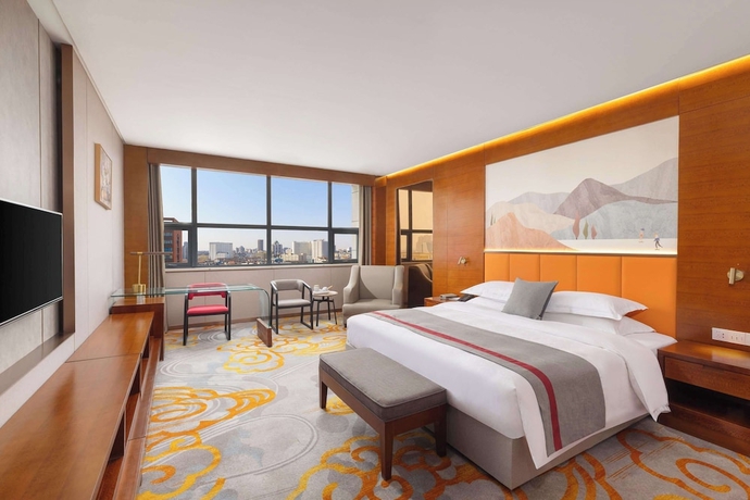Imagen de la habitación del Hotel Ramada Encore by Wyndham Jingzhou Shashi. Foto 9