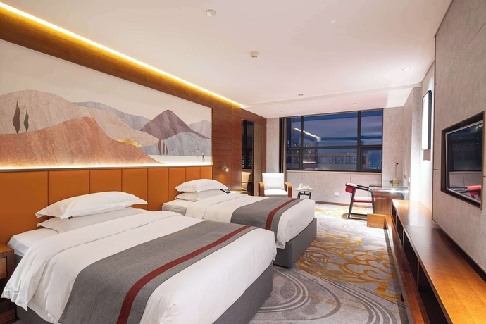 Imagen de la habitación del Hotel Ramada Encore by Wyndham Jingzhou Shashi. Foto 11
