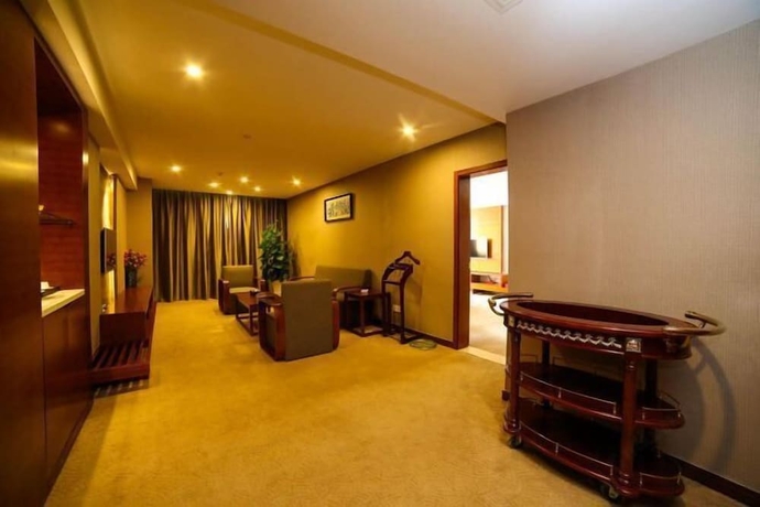 Imagen de la habitación del Hotel Ramada Encore by Wyndham Jingzhou Shashi. Foto 12