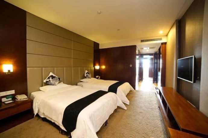 Imagen de la habitación del Hotel Ramada Encore by Wyndham Jingzhou Shashi. Foto 13