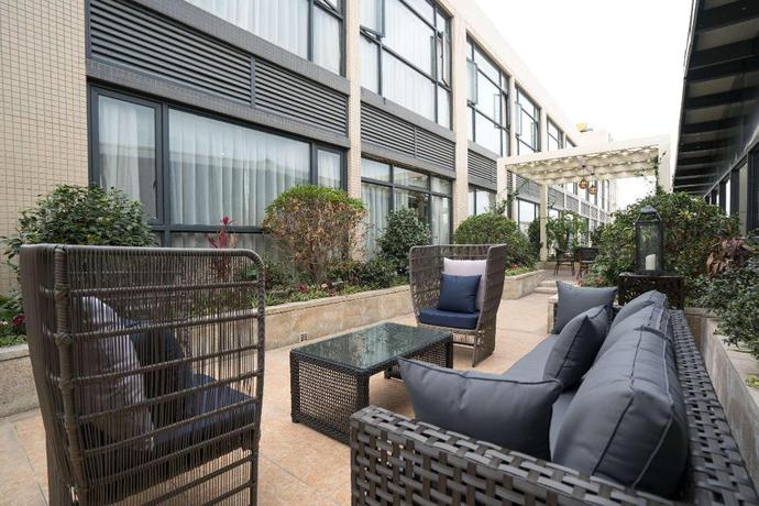 Imagen de la habitación del Hotel Ramada Encore by Wyndham Jintang. Foto 7