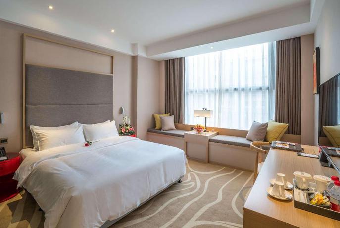 Imagen de la habitación del Hotel Ramada Encore by Wyndham Jintang. Foto 9