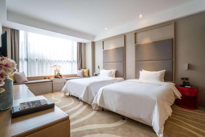 Imagen de la habitación del Hotel Ramada Encore by Wyndham Jintang. Foto 12