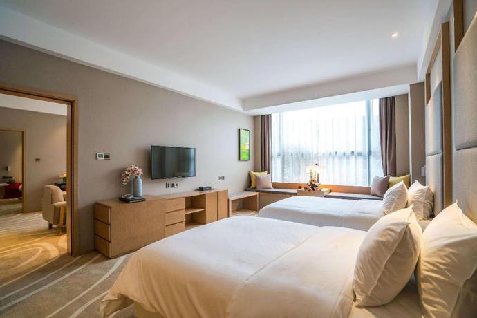 Imagen de la habitación del Hotel Ramada Encore by Wyndham Jintang. Foto 13