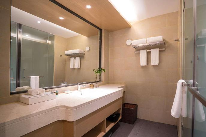 Imagen de la habitación del Hotel Ramada Encore by Wyndham Jintang. Foto 14