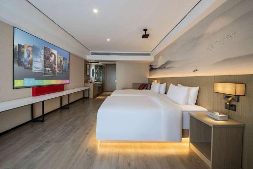 Imagen de la habitación del Hotel Ramada Encore by Wyndham Kunming Guandu. Foto 11