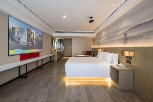 Imagen de la habitación del Hotel Ramada Encore by Wyndham Kunming Guandu. Foto 12