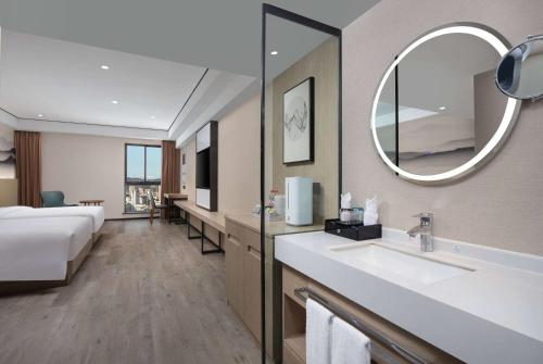 Imagen de la habitación del Hotel Ramada Encore by Wyndham Kunming Guandu. Foto 16