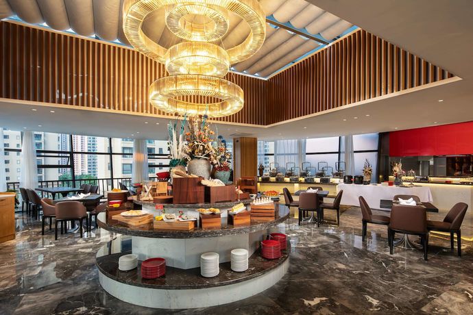 Imagen del bar/restaurante del Hotel Ramada Encore by Wyndham Kunming West. Foto 4