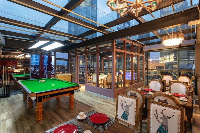 Imagen del bar/restaurante del Hotel Ramada Encore by Wyndham Kunming West. Foto 5