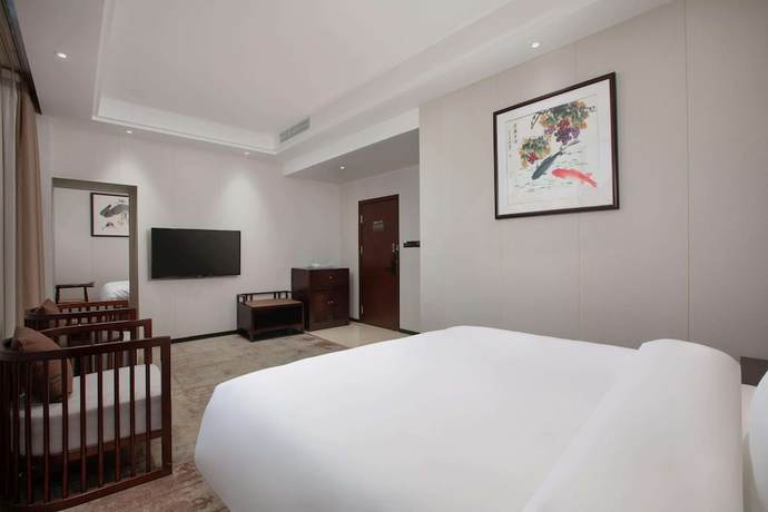 Imagen de la habitación del Hotel Ramada Encore by Wyndham Linqu Downtown. Foto 5