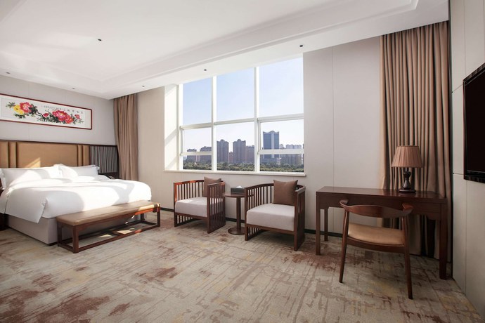 Imagen de la habitación del Hotel Ramada Encore by Wyndham Linqu Downtown. Foto 6
