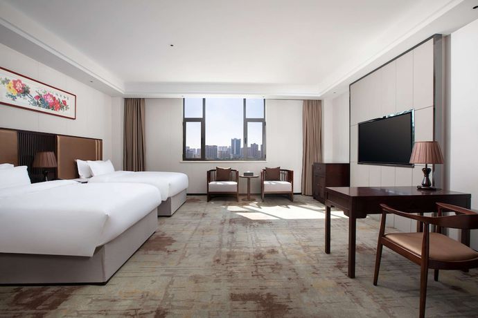 Imagen de la habitación del Hotel Ramada Encore by Wyndham Linqu Downtown. Foto 7