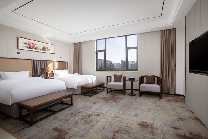 Imagen de la habitación del Hotel Ramada Encore by Wyndham Linqu Downtown. Foto 8