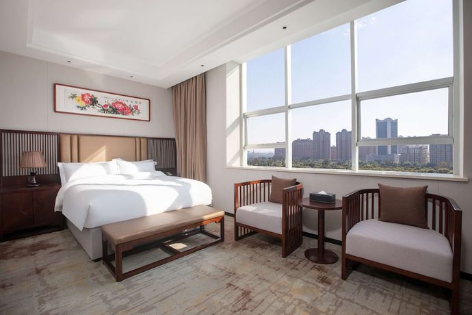 Imagen de la habitación del Hotel Ramada Encore by Wyndham Linqu Downtown. Foto 9