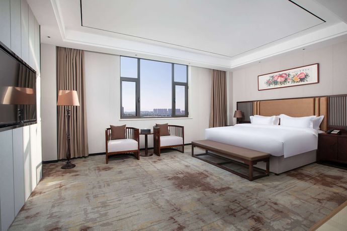 Imagen de la habitación del Hotel Ramada Encore by Wyndham Linqu Downtown. Foto 10