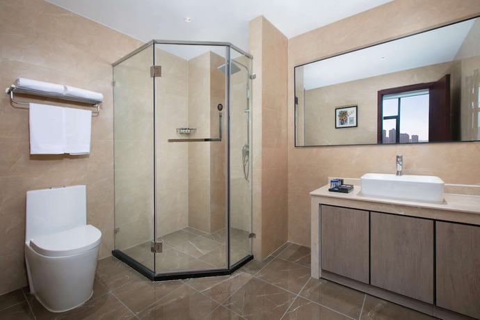 Imagen de la habitación del Hotel Ramada Encore by Wyndham Linqu Downtown. Foto 11