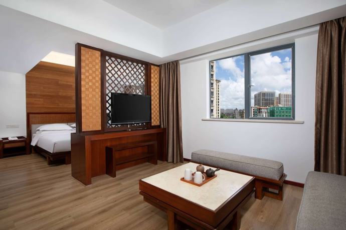 Imagen de la habitación del Hotel Ramada Encore by Wyndham Qionghai Downtown. Foto 4