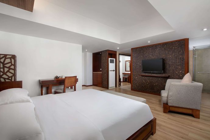 Imagen de la habitación del Hotel Ramada Encore by Wyndham Qionghai Downtown. Foto 8
