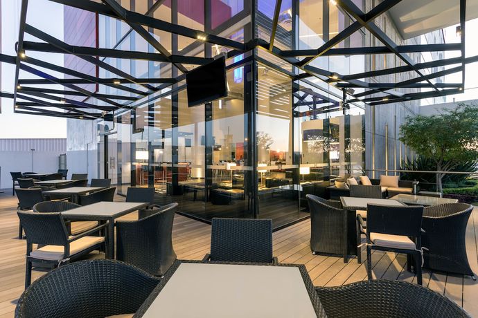 Imagen del bar/restaurante del Hotel Ramada Encore by Wyndham Queretaro. Foto 4