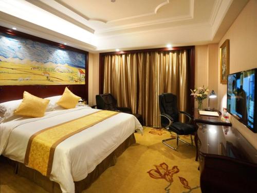 Imagen de la habitación del Hotel Ramada Encore by Wyndham Shanghai South. Foto 7