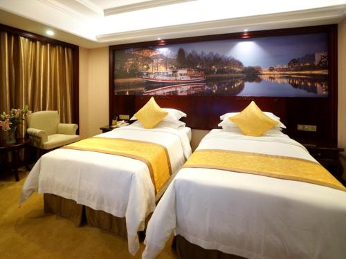 Imagen de la habitación del Hotel Ramada Encore by Wyndham Shanghai South. Foto 8